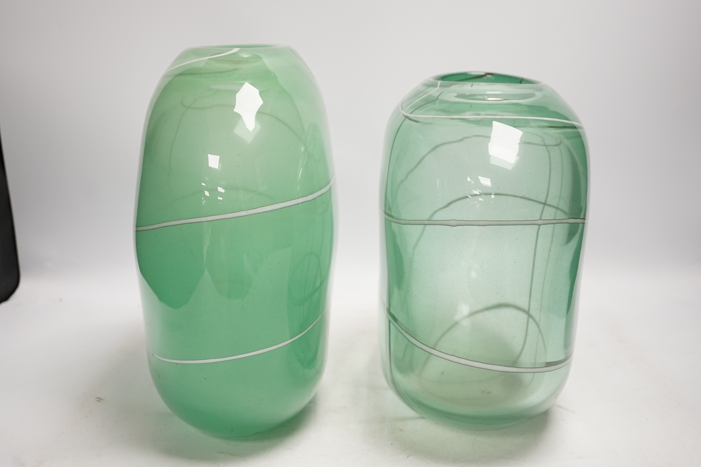 Two Lithuanian, Vilnius Studio green and white art glass vases, with labels, tallest 26.5cm high. Condition - fair to good